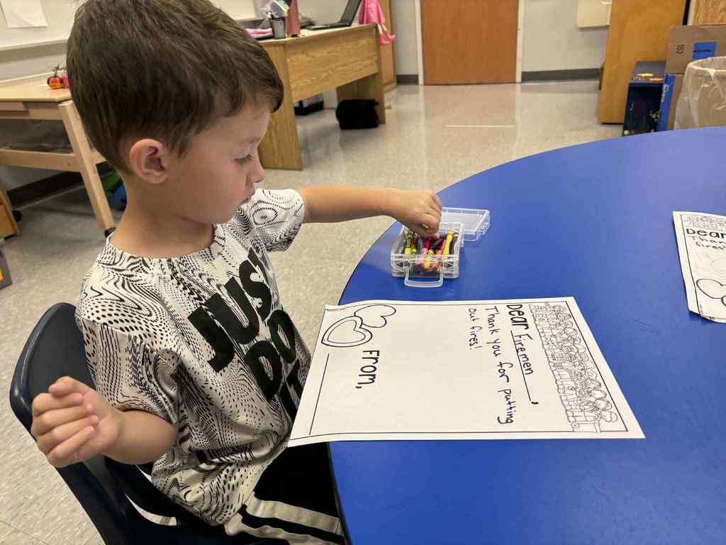 WCS prek writing thank you letters to the Fireman 2025