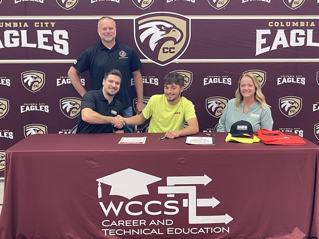 Construction student signs with Michael Kinder and Sons