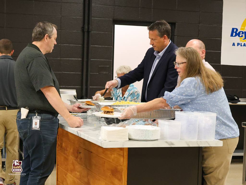 Admin serves lunch