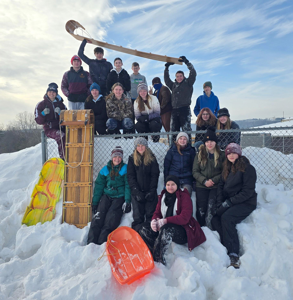 Students in Mr. Leet's Physics class at Whitney Point High School pose with their sleds as they enjoy Physics Day sledding on February 6, 2026.