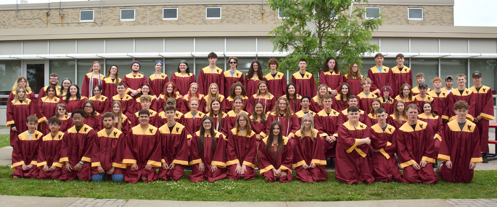 Class of 2025 seniors in their maroon and gold gowns following their Senior Walk