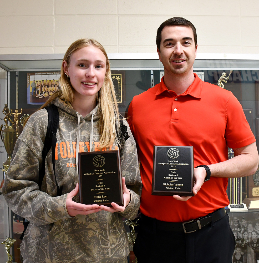 Whitney Point High School senior Billie Leet and her Volleyball Coach Nick Vahon holding their plaques proclaiming them NYS Volleyball Coach Association's Player and Coach of the Year for 2025.