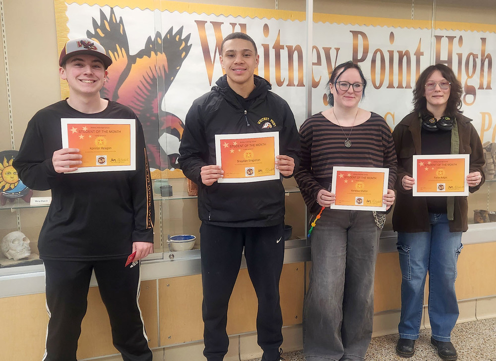 Konnor Reagan, Braydan Singleton,  Vanessa and Ferin Ralph hold their students of the month certificates for March at Whitney Point High School.