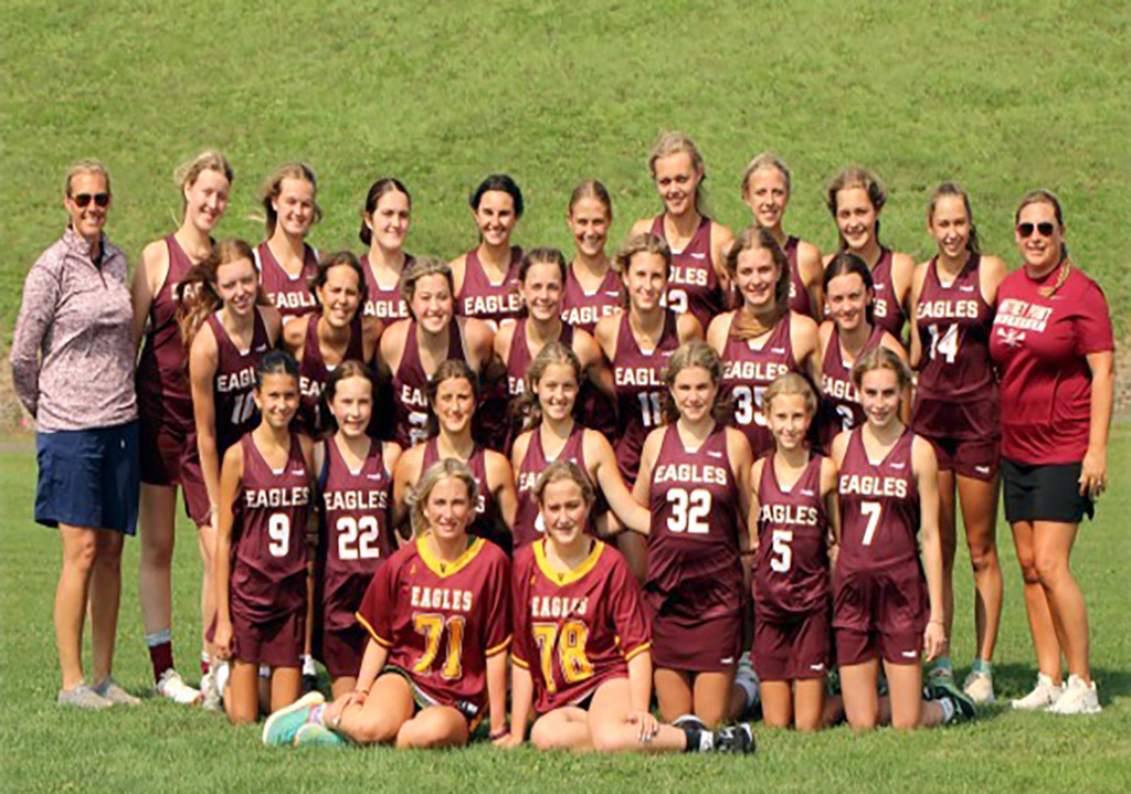 2025-26 Whitney Point High School Varsity Field Hockey team with their coaches.