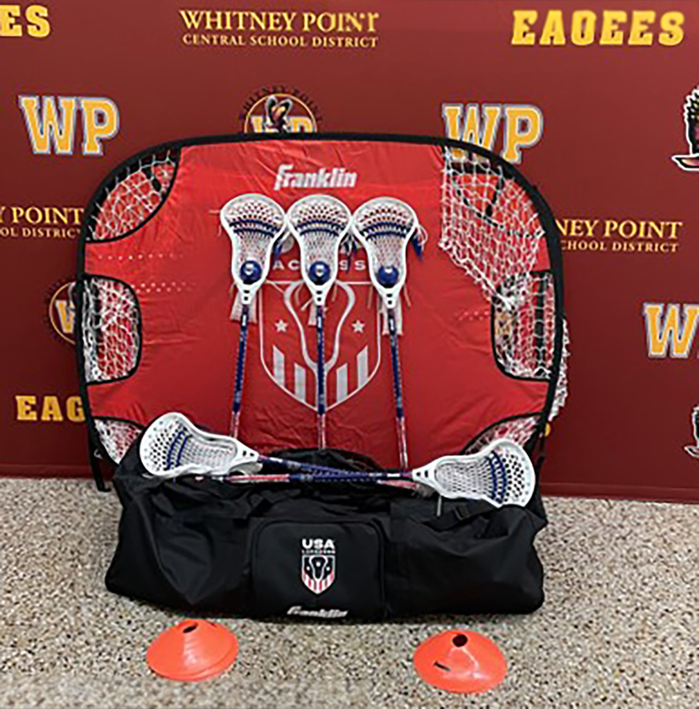 Franklin carry bag with lacrosse sticks, cones, and foam balls from USA Lacrosse awarded to Whitney Point Central School District via a grant.
