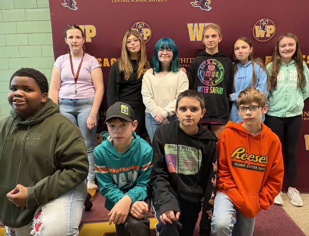 Tioughnioga Riverside Academy recognized ten of its eighth graders as October Students of the Month for improved academics and exemplifying the trait of cooperation .