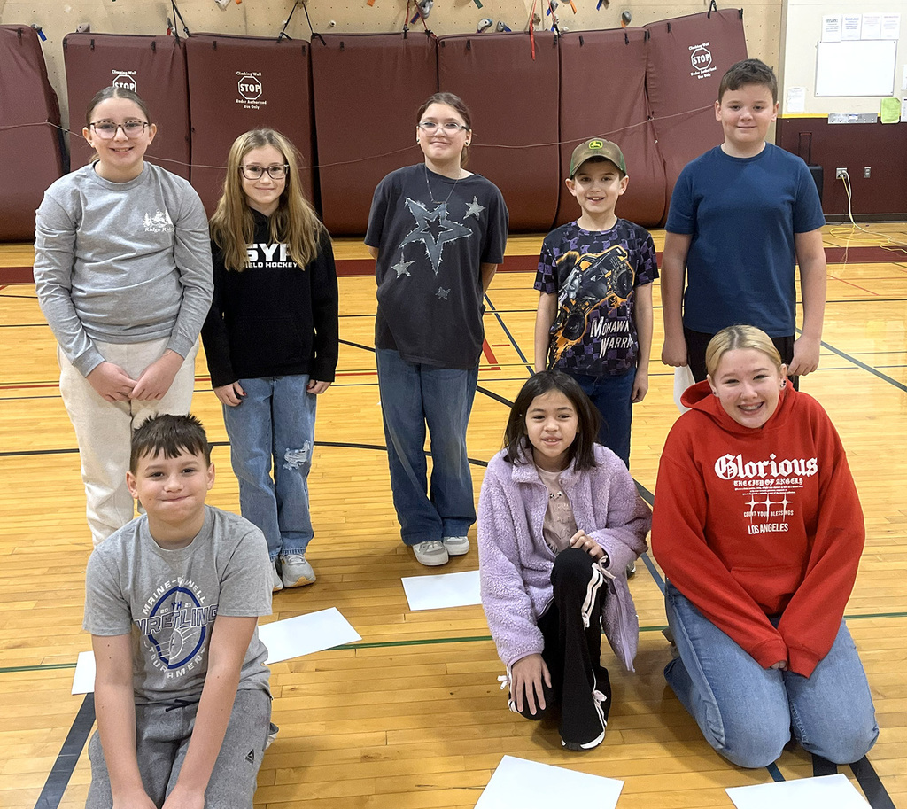 Fifth graders selected as T R A Students of the Month for November 2025.