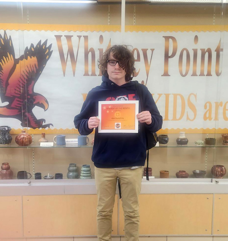 Alexander Humphrey with his Student of the Month certificate for November 2025.