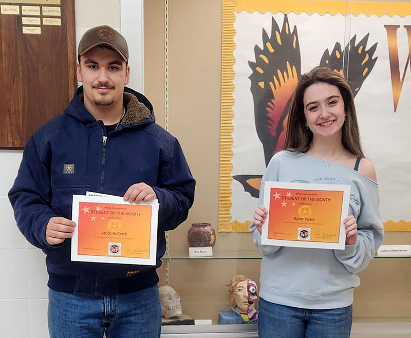 Jacob McGrath and Rylee Taylor with their high school students of the month certificates.