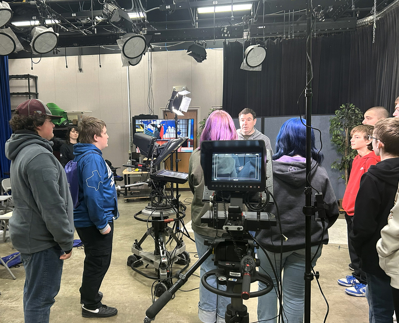 Eighth grade students learn about television production in the studio at SUNY Broome.