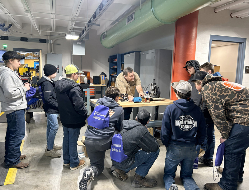 A group of Whitney Point eighth graders pay rapt attention to an instructor in a construction technology classroom at SUNY Broome during this year's SPARK.