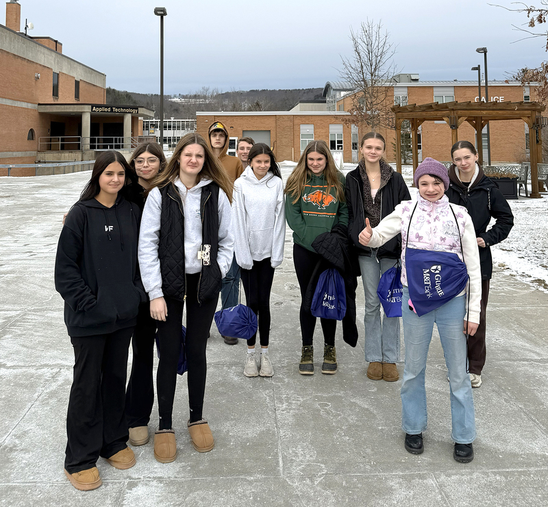 Eighth graders on the SUNY Broome campus brave the cold as they walk to their next SPARK session.