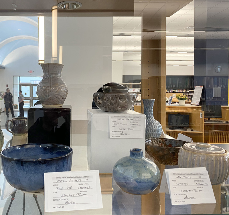 Ceramic art pieces created by Whitney Point High School students are displayed in the daVince Visual Arts Festival at the Broome County Public Library.