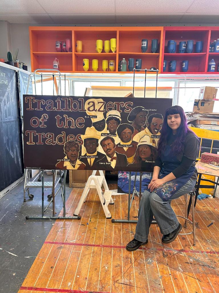 student with their art