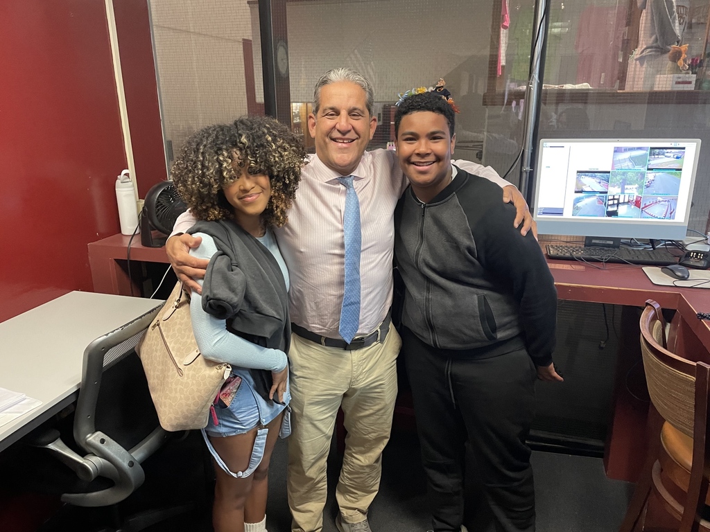 Students with Principal for Morning Announcements