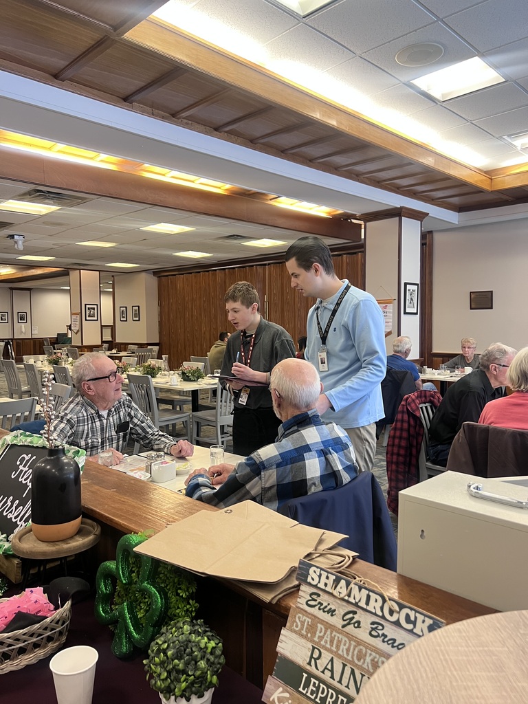 Aaron Smith and Mr. Kedian during Breakfast Service