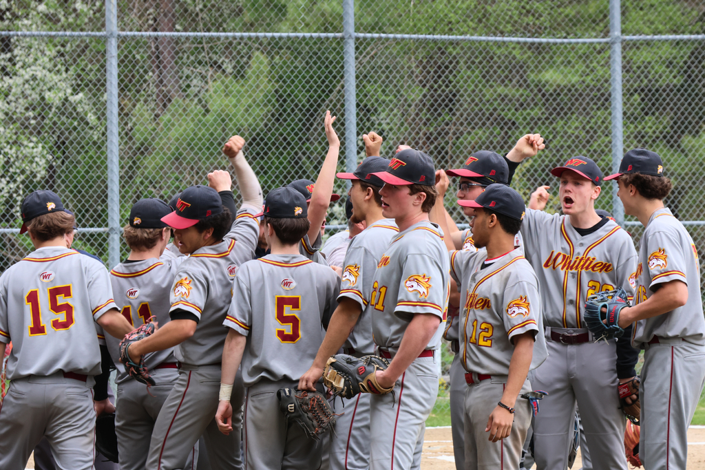 Whittier Tech Baseball Players huddle before the Senior Night game.
