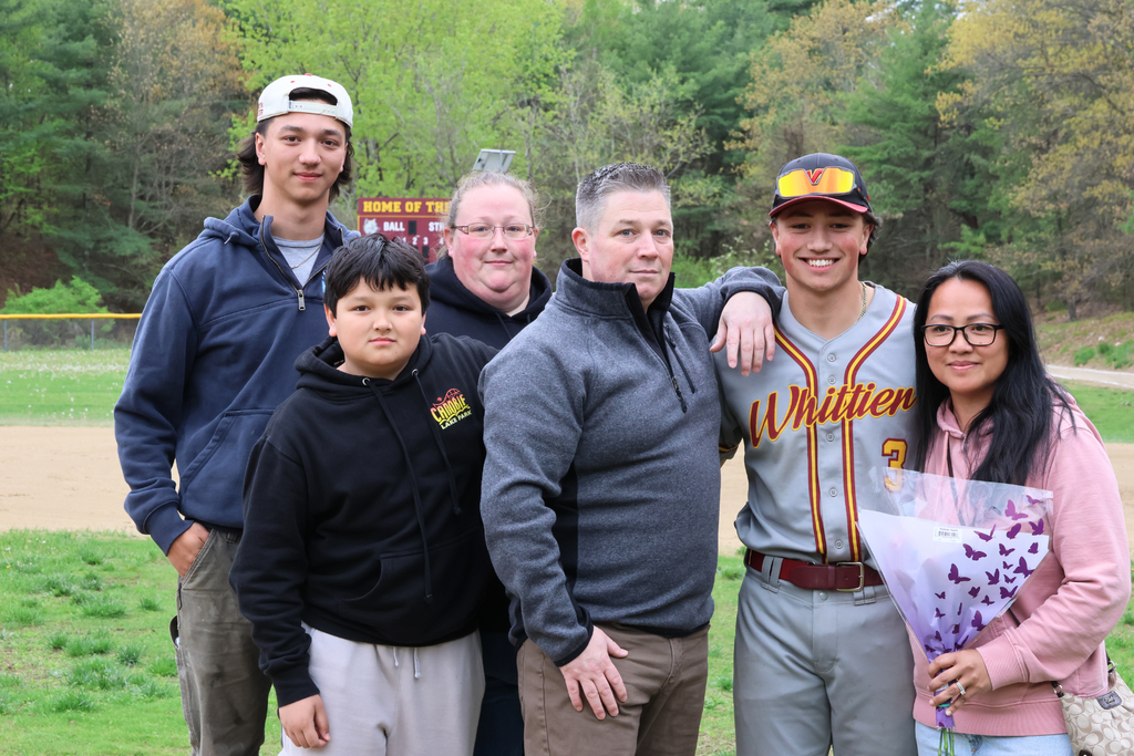 Senior Nate Comeu with his family on Senior Night for Whittier Tech Varsity Baseball.
