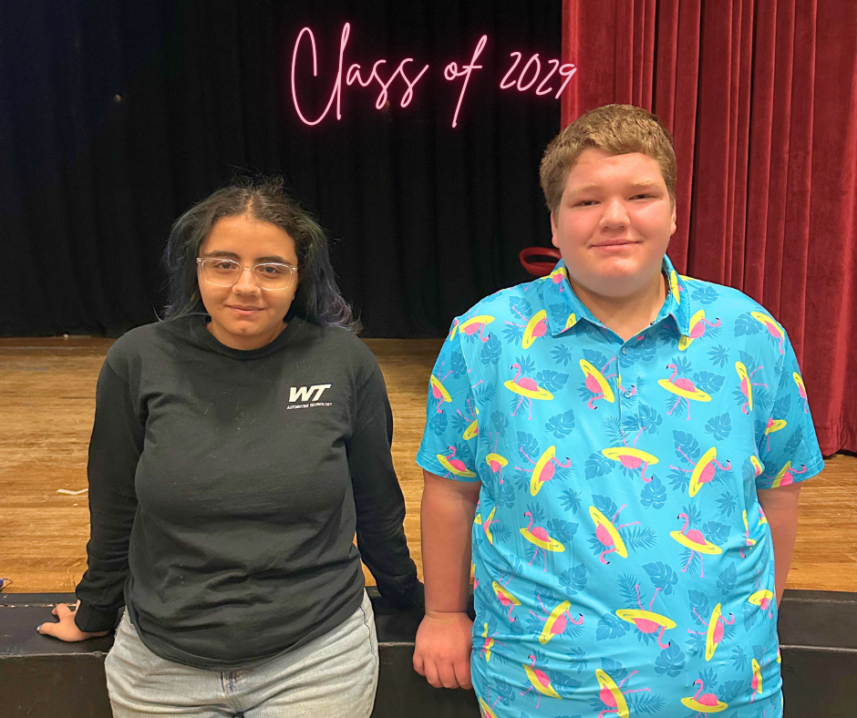 Two students in the Class of 2029 standing in the auditorium after presenting their candidate speeches for Student Government.
