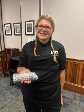 Hospitality junior Brianna Graham is pictured with the first burrito of the year, affectionately known around Whittier Tech as the “World Famous Burrito!”