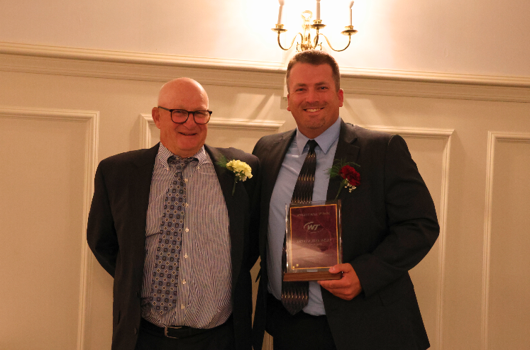 Coach Joe Boland and Andrew Wells