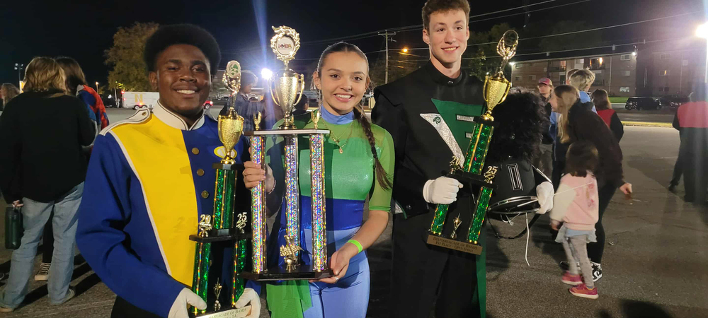 Three drum majors with trophies at Delmarvacade