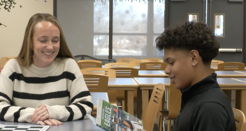 Image of Wi Middle student Eddy Almonte chatting with Assistant Principal Melissa Lasinski