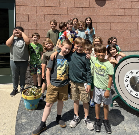 students wear green