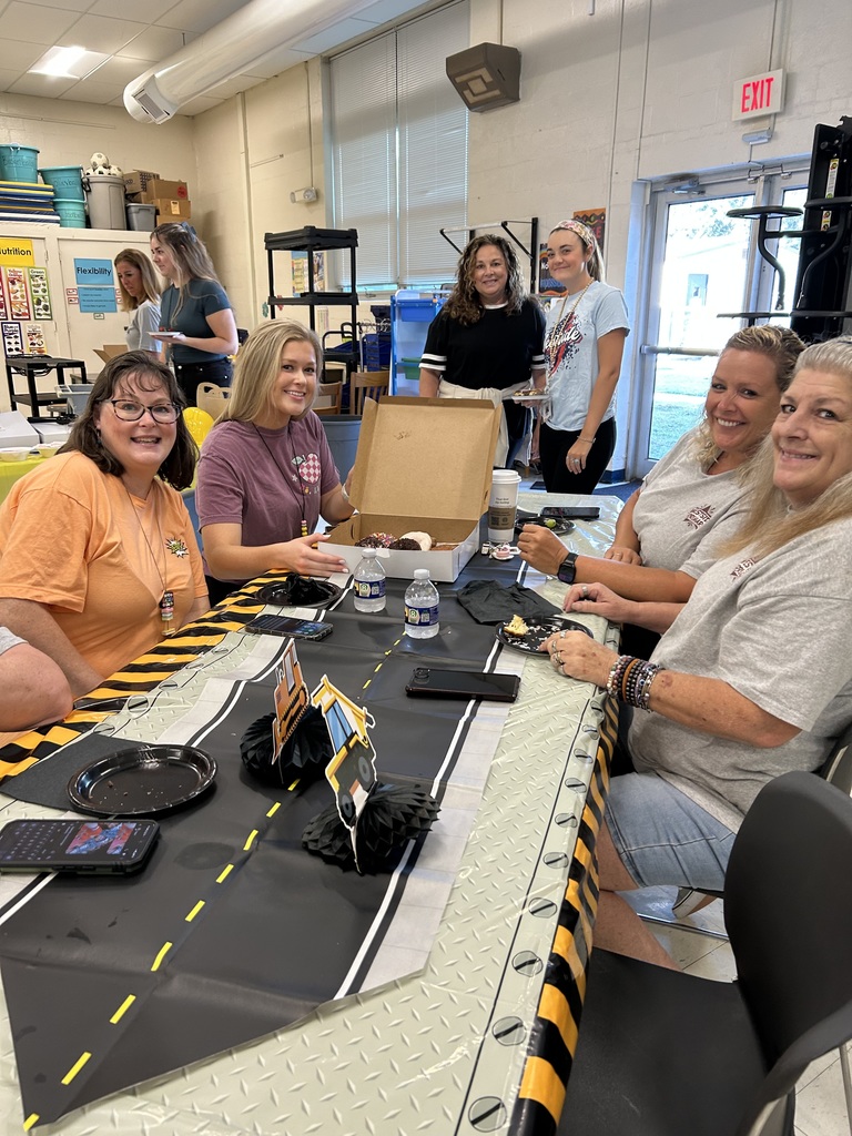 teachers enjoying donuts