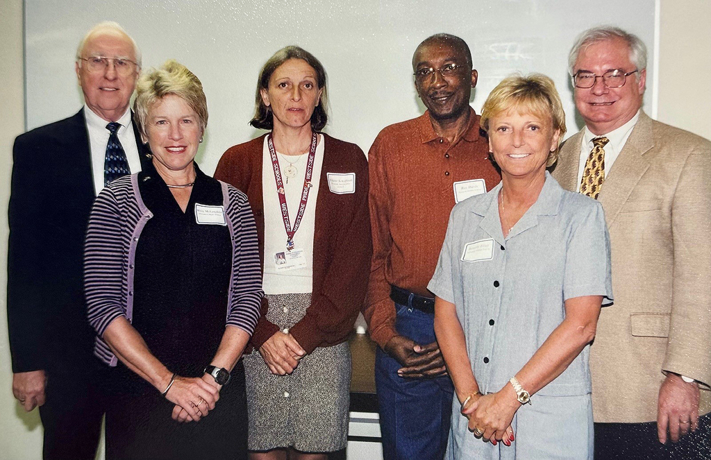 Superintendent of Schools William Middleton, left, at a celebration of Just Because honorees