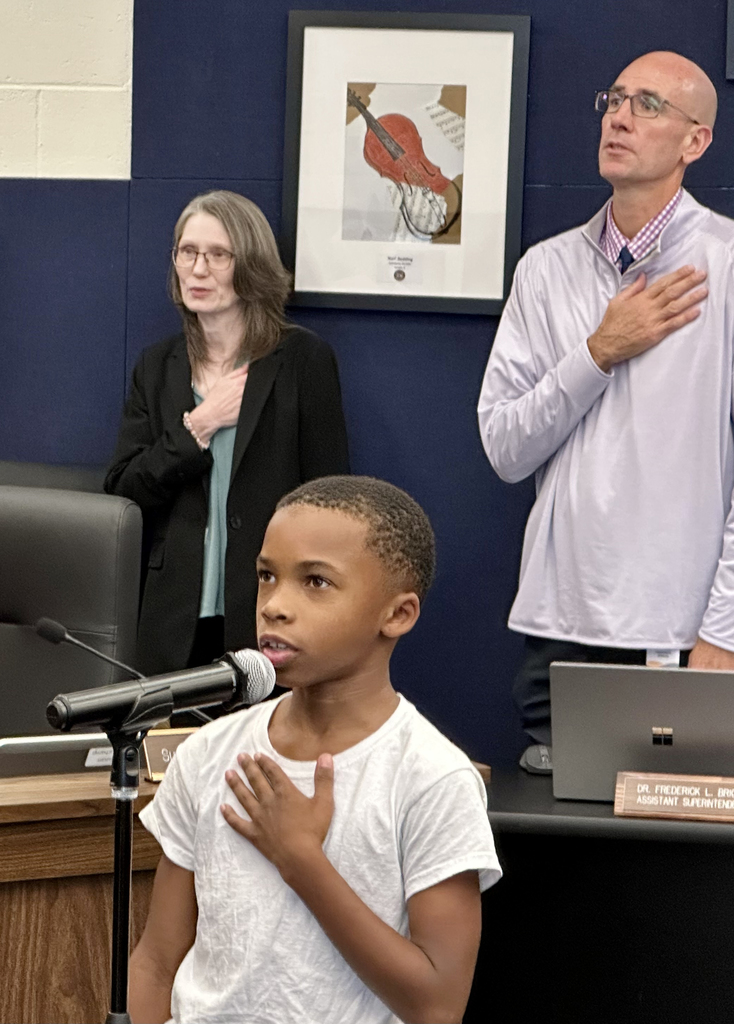 Student leads Pledge of Allegiance at Board of Ed meeting