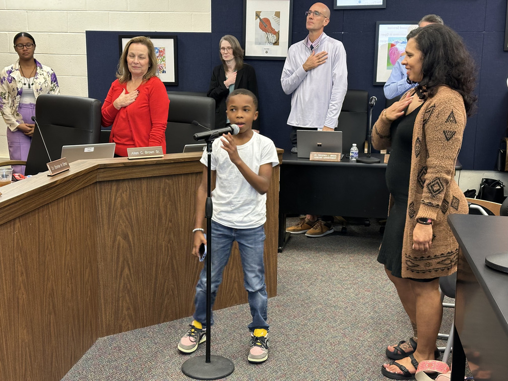 Student leads Pledge of Allegiance at Board of Ed meeting