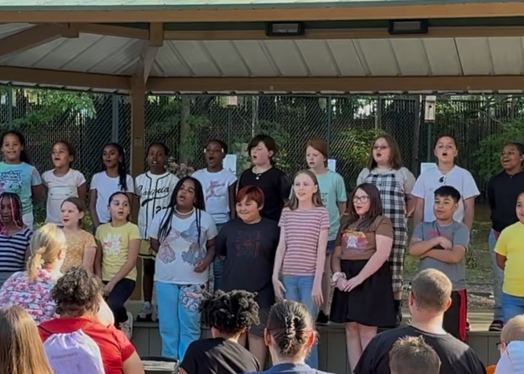 The Prince Street Choir sang at our zoo event in 2025.