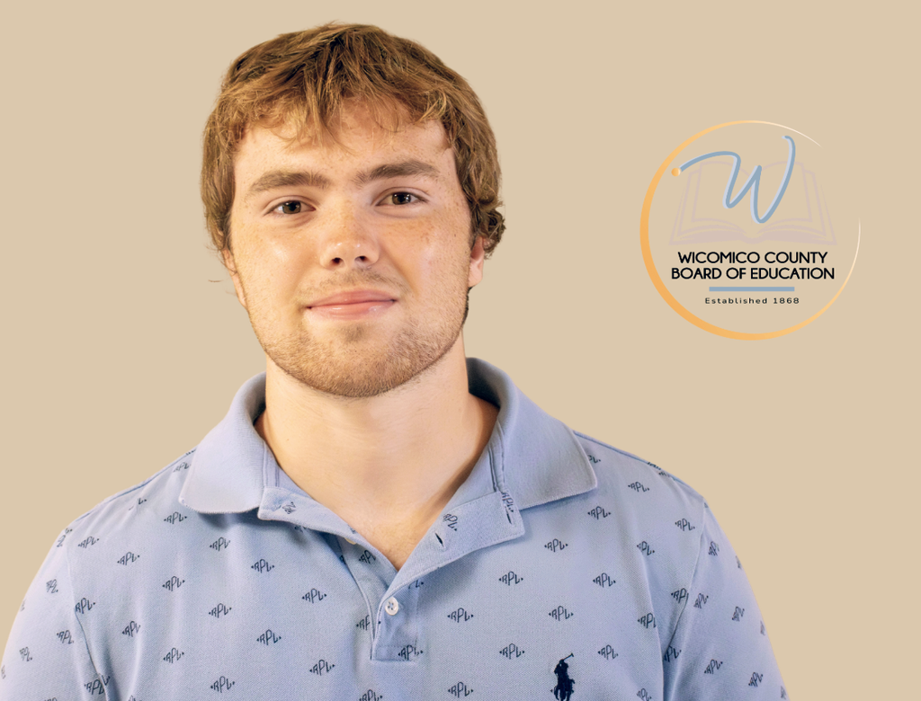 Photo of Wicomico Student Member of the Board Andrew Yates with Board logo