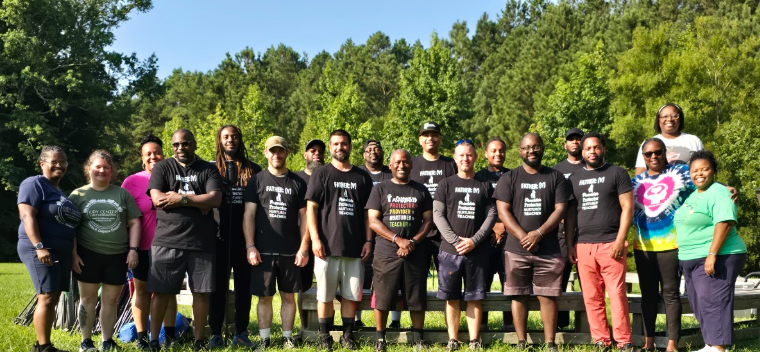 Judy Center Staff and the Men from the retreat group picture