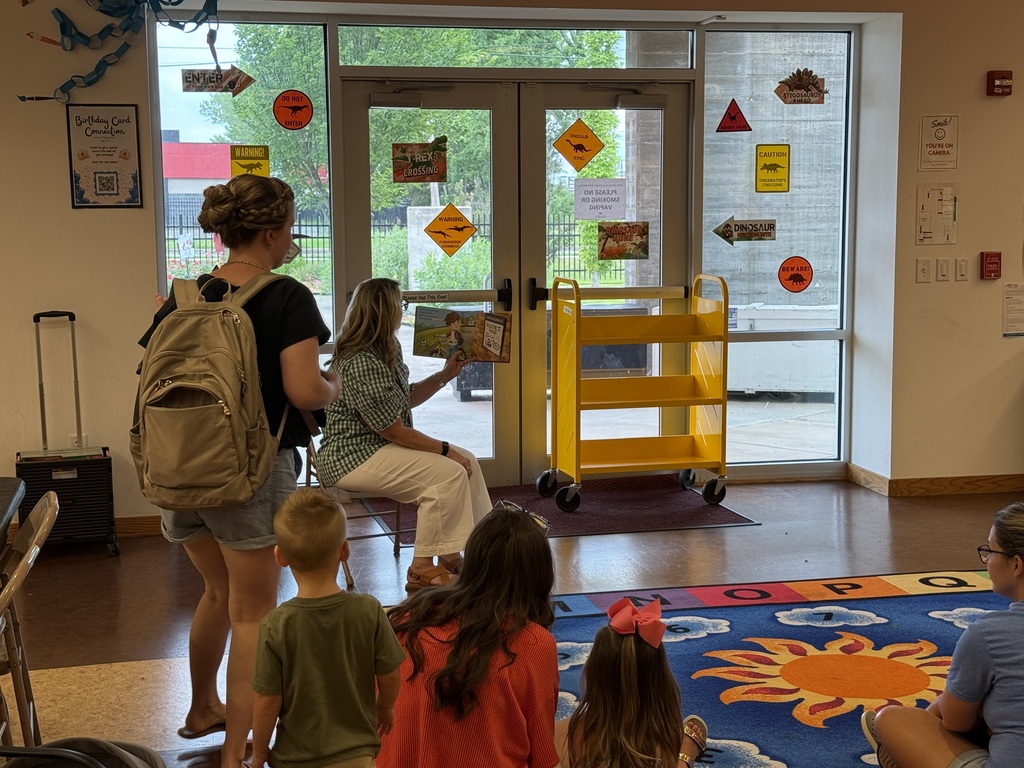 Local LEADS team talking to parents and children at Cabot Public Library