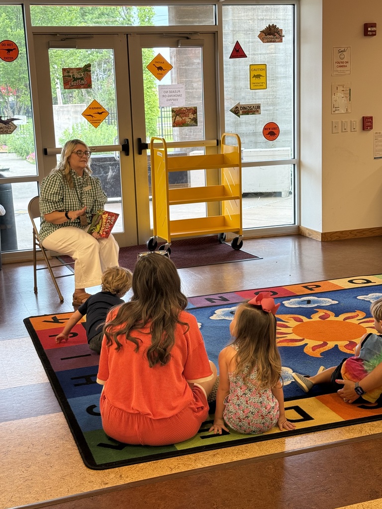 Local LEADS team talking to parents and children at Cabot Public Library