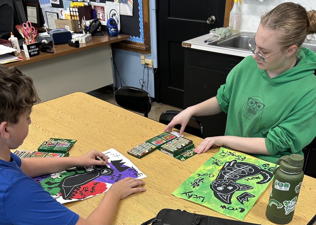 8th grade students workin on art projects