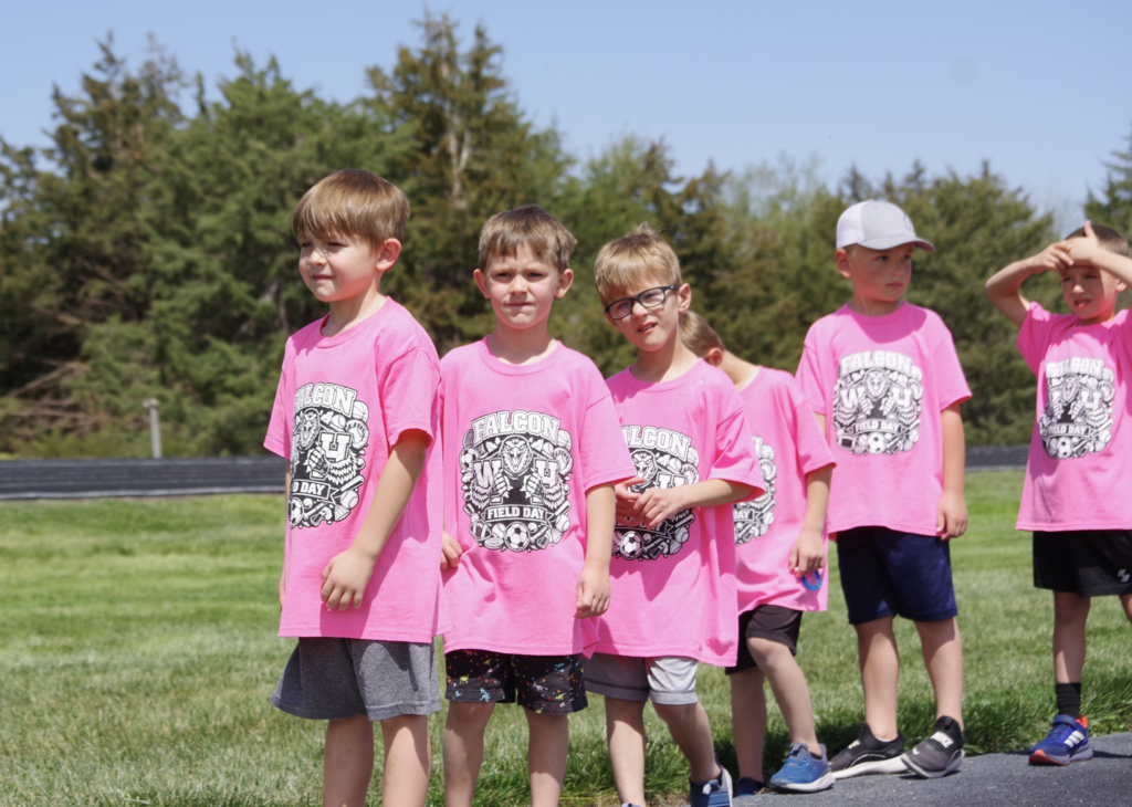 Kindergarten doing long jump.