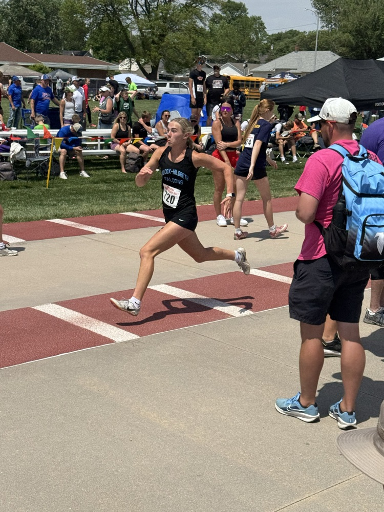 Ellie Blank competing in triple jump at JH State