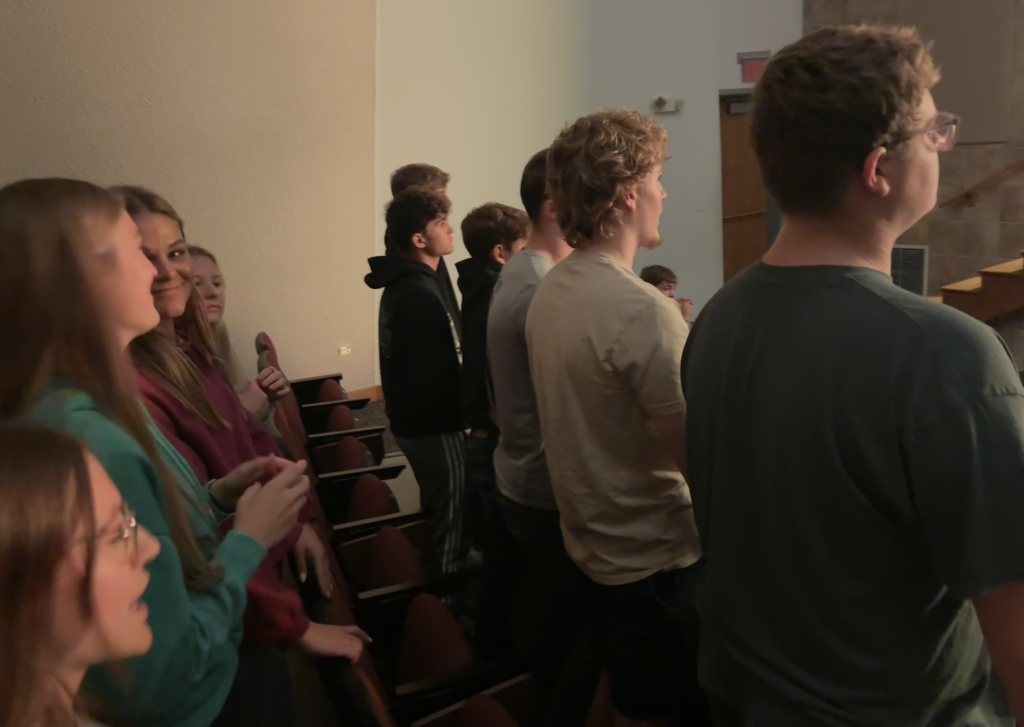 Taylor, Alex, Jadon, Kinley, Elin, Allegra, Keegan, Kaden, Stetson, Rylan watching the show while singing and dancing along