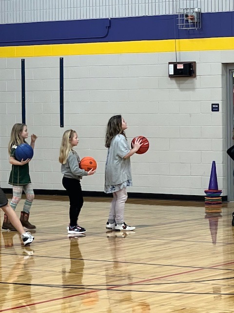 boys basketball team teaches CLC