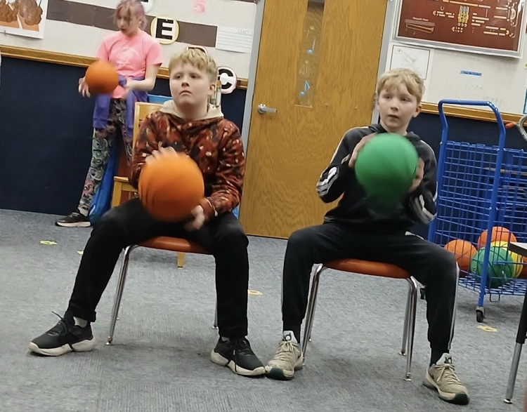 using basketballs to learn rhythm in music class