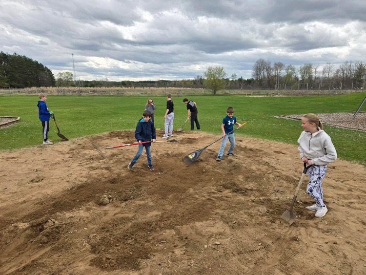 student government helps clean playground