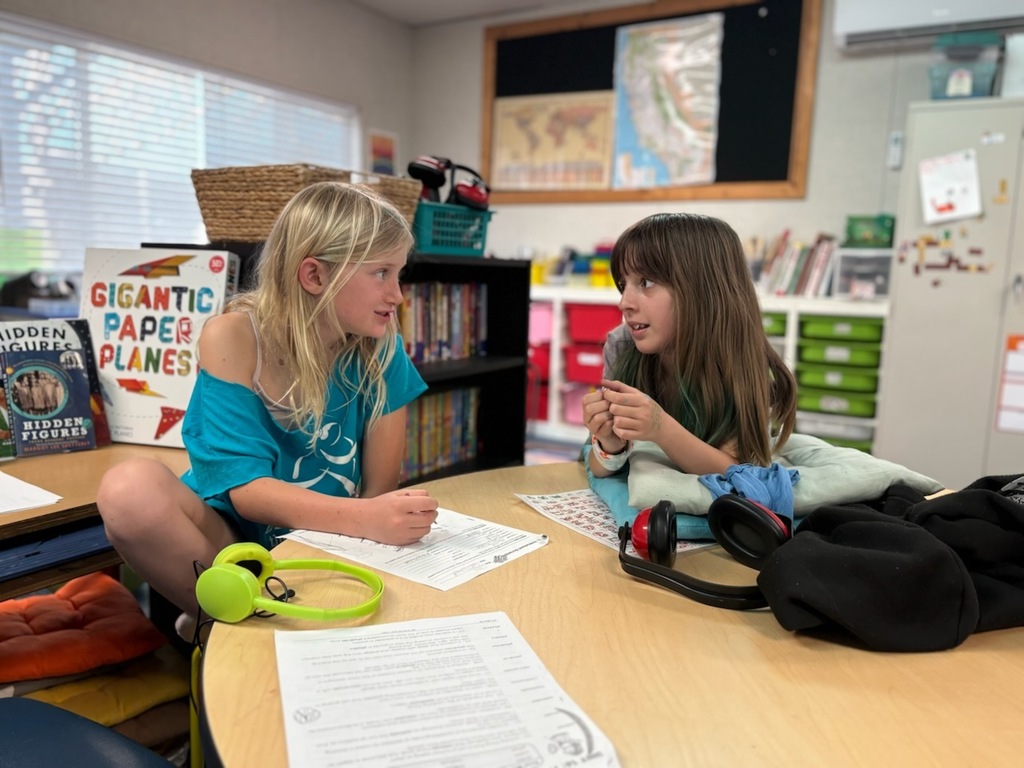 Seen above is two of our Starflowers talking about this year's class themes!