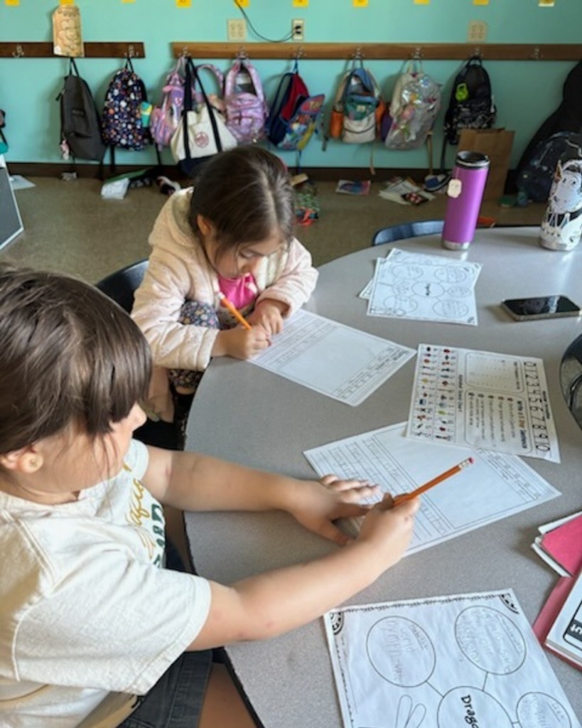 Another group working on their writing skills!