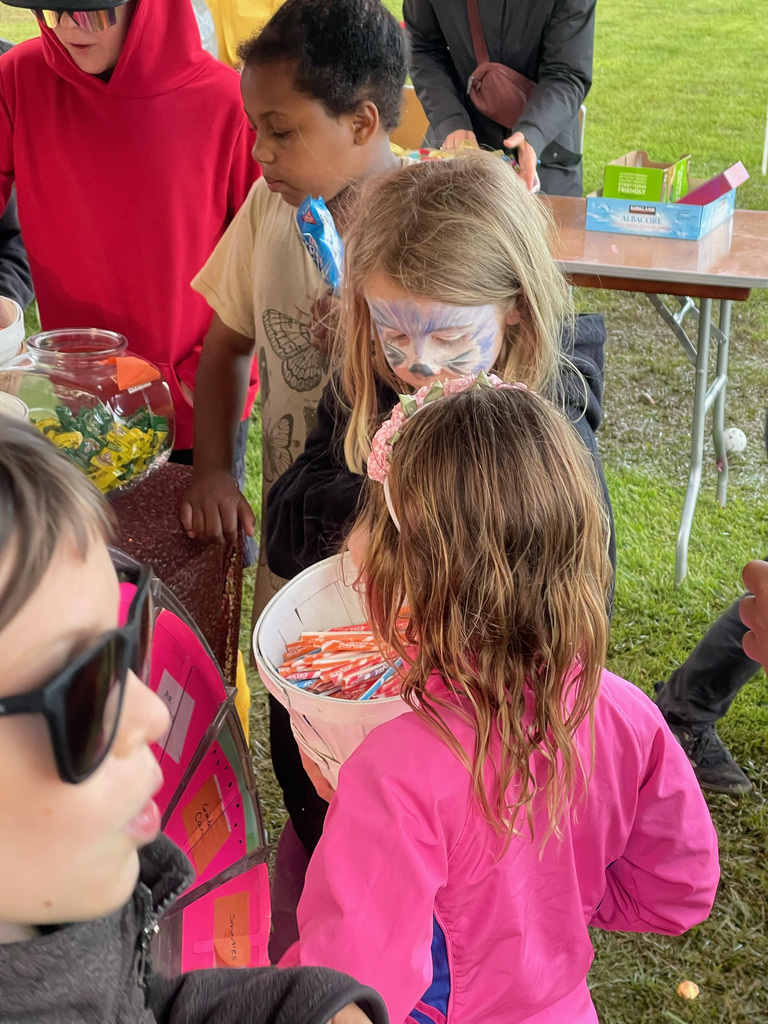 Some kiddos enjoying the face paint booth at last year's festival!