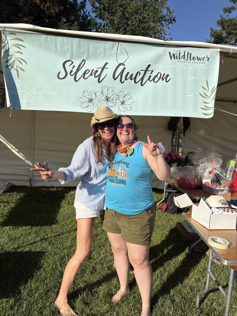 A hardworking duo who kept our silent auction up and running last year!