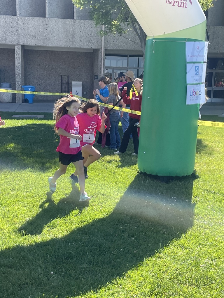 Two of our girls finishing the race together!