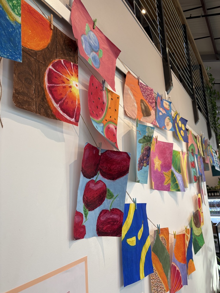 Some of our students' sour citrus and sweet fruit oil pastel drawings!